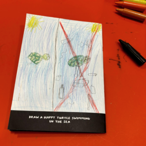 FILL Drawing Booklet: Draw a happy turtle swimming in the sea